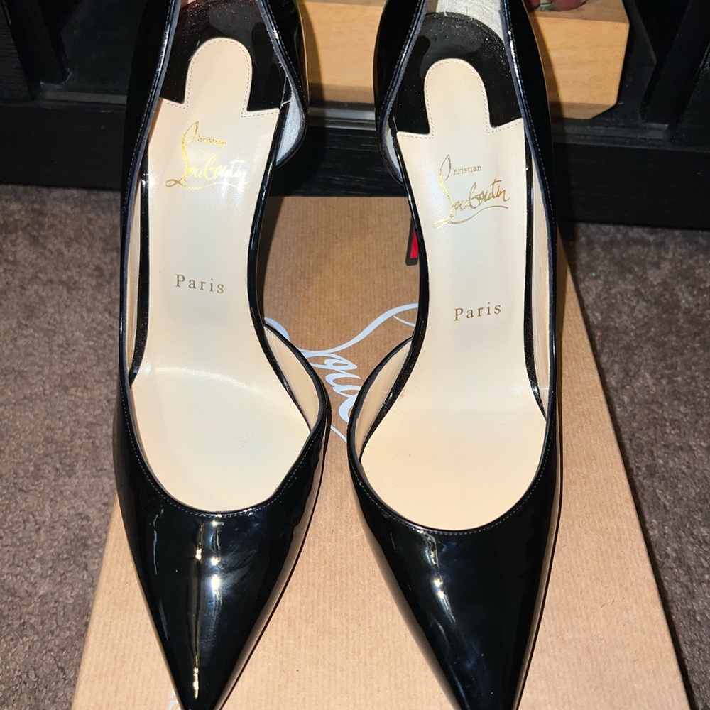 Brand New Never worn Christian louboutin Iriza size 42.